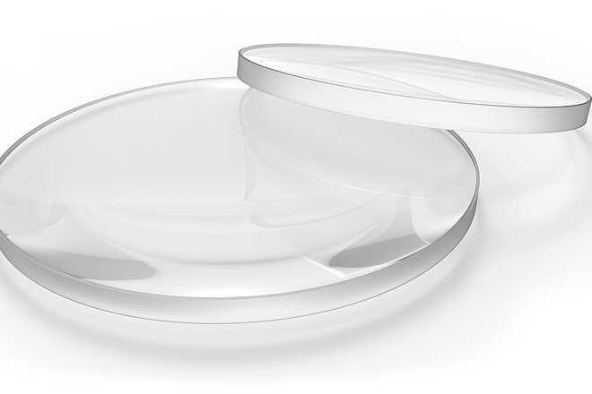 Spherical lenses - Transparent, at least partially spherically curved glass or plastic discs for the refraction of light